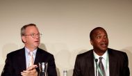 Google Executive Chairman Eric Schmidt (L) and David Drummond, Google's Senior Vice President of Corporate Development, react before a meeting about the 