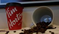 A Tim Hortons coffee cup and coffee beans are displayed at the coffee shop during a media event a day before its opening in San Pedro Garza Garcia, neighboring Monterrey, Mexico, October 26, 2017. Reuters/Daniel Becerril 