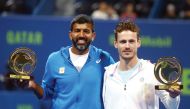 India's Rohan Bopanna (left) and Wesley Koolhof of the Netherlands celebrate during the presentation ceremony after winning the Doubles final of the Qatar ExxonMobil Open 2020 at the Khalifa International Tennis and Squash Complex in Doha, yesterday. (Pic