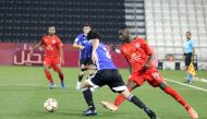 Al Duhail's AlMoez Ali (right) vies for ball possession with an Al Sailiya player during the semi-final yesterday.