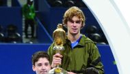 Russia's Andrey Rublev poses with the ball boys after winning the Qatar ExxonMobil Open final. Picture:  Salim Matramkot/The Peninsula