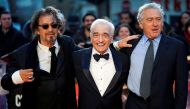 Director Martin Scorsese and cast members Al Pacino and Robert De Niro pose as they arrive for the screening of