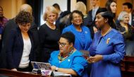Democratic delegates including women and minorities congregate on the floor of the House as the General Assembly prepares to convene in Richmond, Virginia, U.S. January 8, 2020. Reuters/Jonathan Drake