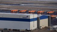 FILE PHOTO: Airplane fuselages bound for Boeing's 737 Max production facility sit in storage behind Spirit AeroSystems Holdings Inc headquarters, in Wichita, Kansas, U.S. December 17, 2019. REUTERS/Nick Oxford/File Photo