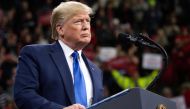 US President Donald Trump gestures as he speaks during a 