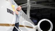 A Bombardier employee polishes the sign of Bombardier Global 7500 shown during a media tour in Montreal, December 19, 2018. Reuters / Christinne Muschi