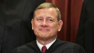 In this file photo taken on November 30, 2018 Chief Justice John Roberts poses for the official group photo at the US Supreme Court in Washington, DC.  AFP / Mandel Ngan
