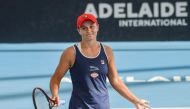 Ashleigh Barty of Australia reacts after defeating Dayana Yastremska of Ukraine in their women's final singles match at the Adelaide International tennis tournament in Adelaide on January 18, 2020. AFP / Brenton Edwards 