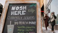 A cafe advertises an ‘Im-Peach-Mint’ drink, referring to the impeachment of US President Donald Trump, in Des Moines, Iowa, January 18, 2020. Reuters/Brian Snyder
 