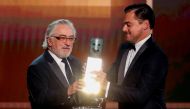26th Screen Actors Guild Awards - Show - Los Angeles, California, U.S., January 19, 2020 - Robert De Niro accepts the Life Achievement Award from presenter Leonardo DiCaprio. REUTERS/Mario Anzuoni