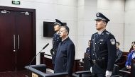 This handout photo taken on January 21, 2020 and released by the Tianjin First Intermediate People's Court shows former Interpol chief Meng Hongwei (C) during his sentencing at the court in the Chinese city of Tianjin.AFP PHOTO / TIANJIN FIRST INTERMEDIAT