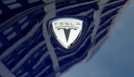 A logo of Tesla Motors on an electric car model is seen outside a showroom in New York, June 28, 2010. Reuters / Shannon Stapleton