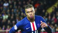 Paris Saint-Germain's French forward Kylian Mbappe celebrates after scoring a goal during the French L1 football match between Monaco (ASM) and Paris Saint-Germain (PSG) at the Louis II Stadium in Monaco on January 15, 2020. AFP / Valery Hache
