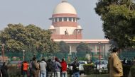 Television journalists are seen outside the premises of the Supreme Court in New Delhi, India, January 22, 2020. REUTERS/Anushree Fadnavis