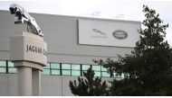FILE PHOTO: Signs are seen outside the Jaguar Land Rover plant at Halewood in Liverpool, northern England, September 12 , 2016. REUTERS/Phil Noble