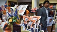 Souvenir items bearing images of Thanathorn Juangroongruangkit, leader of the opposition Future Forward party, are displayed at the party's headquarters in Bangkok on January 21, 2020. AFP / Romeo Gacad 