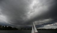 Storm clouds gather over Sydney Harbour on January 20, 2020. AFP / Peter Parks 