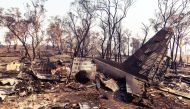 Debris seen following the crash of a C-130 air tanker plane after dropping fire retardant, in this January 24, 2020 picture obtained from social media, in Snowy Mountains, New South Wales, Australia. New South Wales Police via Reuters