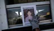 Representative image (A woman holds the photograph of a relative lost in fight between drug gangs during a serach at Escobedo on the outskirts of Monterrey, Mexico, August 12, 2016. Reuters / Daniel) 