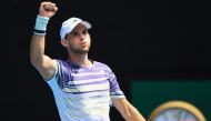 Austria's Dominic Thiem celebrates after beating France's Gael Monfils during their men's singles match on day eight of the Australian Open tennis tournament in Melbourne on January 27, 2020. AFP / William West 