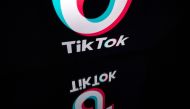  In this file photo taken on November 21, 2019 the logo of the social media video sharing app tiktok is displayed on a tablet screen in Paris.  / AFP / Lionel BONAVENTURE