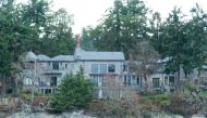 The residence of Prince Harry and his wife Meghan is seen in Deep Cove Neighborhood from a boat on the Saanich Inlet, North Saanich, British Columbia on January 21, 2020.  AFP / Mark GOODNOW