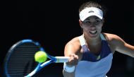 Spain's Garbine Muguruza hits a return against Russia's Anastasia Pavlyuchenkova during their women's singles quarter-final match on day ten of the Australian Open tennis tournament in Melbourne on January 29, 2020. AFP / Greg Wood 