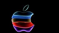 In this file photo taken on September 10, 2019 the apple logo is projected on a screen before the start of a product launch event at apple's headquarters in Cupertino, California. / AFP / Josh Edelson
