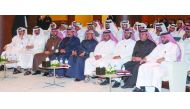 H E Ali bin Ahmed Al Kuwari (front, centre), Minister of Commerce and Industry, and other officials at the annual ceremony to celebrate the Ministry’s achievements under the theme “2019 Harvest”, yesterday. 