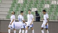 Al Khor's players celebrate their goal against Al Ahli yesterday.