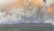  Smoke rises as the Big Jack Mountain fire spreads in Bega Valley, New South Wales, Australia, February 1, 2020. NSW Rural Fire Service/Handout via REUTERS ATTENTION EDITORS - THIS IMAGE HAS BEEN SUPPLIED BY A THIRD PARTY. 