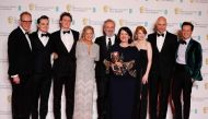 Pippa Harris, Callum McDougall, Sam Mendes, Jayne-Ann Tenggren pose with their award for Best Film for '1917' alongside Dean-Charles Chapman, George MacKay, Mark Strong, Krysty Wilson-Cairns and Andrew Scott at the British Academy of Film and Television