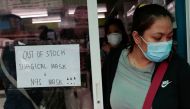  A sign is posted on a medical supply store that says surgical and N95 masks are already out of stock January 31, 2020. REUTERS/Eloisa Lopez 