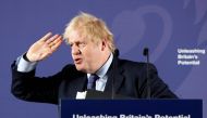 Britain's Prime Minister Boris Johnson reacts as he delivers a speech at the Old Royal Naval College in Greenwich, south east London on February 3, 2020. AFP pool/ Frank Augstein
 