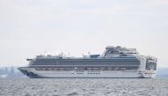 The Diamond Princess cruise ship with over 3,000 people sits anchored in quarantine off the port of Yokohama on February 4, 2020, a day after it arrived with passengers feeling ill. Japan has quarantined the cruise ship carrying 3,711 people and was testi