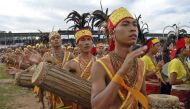 A group of Garo tribal men beat drums to establish a new world record of drum assembles at Shillong, the capital of India's northeastern state of Meghalaya, October 28, 2006. Reuters/Utpal Baruah