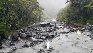 This handout picture taken on February 3, 2020 and released by the New Zealand Transport Agency shows a main highway evastated by the flood after severe flooding near Mataura in New Zealand's South Island. AFP PHOTO 