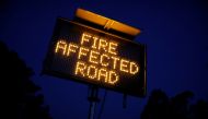  Signage is seen on the bushfire affected Bruthen-Buchan Road near Buchan, Victoria, australia, January 25, 2020. REUTERS/Andrew Kelly 