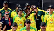 Former Indian player Sachin Tendulkar (centre L) and West Indies player Brian Lara (centre-R) pose for a selfie after a celebrity cricket match to raise funds for people affected by the Australian bushfires, in Melbourne on February 9, 2020. / AFP / WILLI