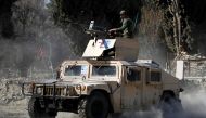 An armoured vehicle patrols near the side of an incident where two U.S soldiers were killed a day before in Shirzad district of Nangarhar province, Afghanistan February 9, 2020.REUTERS/Parwiz