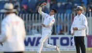 Pakistan's Naseem Shah (C) delivers the ball during the third day of the first cricket Test match between Pakistan and Bangladesh at the Rawalpindi Cricket Stadium in Rawalpindi on February 9, 2020. (AFP / AAMIR QURESHI)