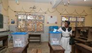 A woman casts her ballot during the general and municipal elections in Yaounde on February 9, 2020. AFP 