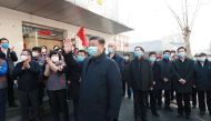 Chinese President Xi Jinping inspects the novel coronavirus prevention and control work at Anhuali Community in Beijing, China, February 10, 2020.