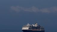 MS Westerdam, a cruise ship that has been turned away by five countries over fears that someone aboard may have the coronavirus, is seen arriving in Sihanoukville port in Cambodia February 13, 2020. REUTERS/Stringer