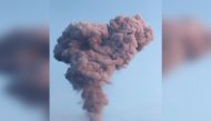 Two kilometers ashes spew from Mount Merapi mount during an eruption as seen from Yogyakarta on February 13, 2020. AFP / RANTO KRESEK