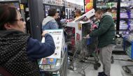 People wait in line pay at a Walmart during a sales event on Thanksgiving day in Westbury. New York, US, November 22, 2018. Reuters / Shannon Stapleton