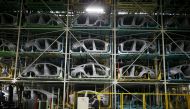A worker stands in front of parts of Hyundai Motor's sedans at its plant in Asan, South Korea, January 27, 2016. Reuters/Kim Hong-Ji