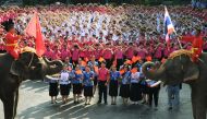 Elephants join Thai students as they form a heart shape on Valentine's Day to show their support for China in the fight against coronavirus at a school in Ayutthaya, outside Bangkok, Thailand February 14, 2020. REUTERS/Chalinee Thirasupa