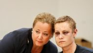 Philip Manshaus who is suspected of an armed attack at Al-Noor Islamic Centre Mosque and killing his stepsister with his lawyer Unni Fries  in court in Oslo, Norway, August 12, 2019. NTB Scanpix / Cornelius Poppe via Reuters
