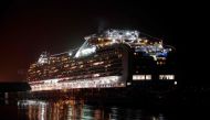 Diamond Princess cruise ship, with people, quarantined onboard due to fears of the new COVID-19 coronavirus, is docked at the Daikaku Pier Cruise Terminal in Yokohama port on February 16, 2020. AFP / Behrouz Mehri 